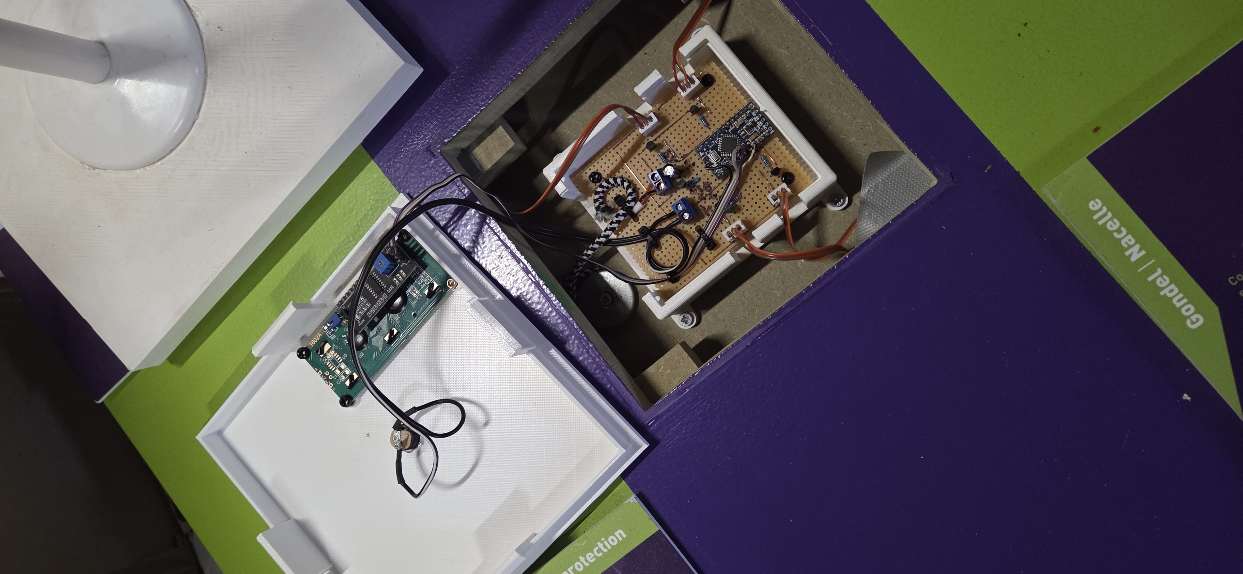 The control electronics secured in a 3D printed housing to prevent damage to the board