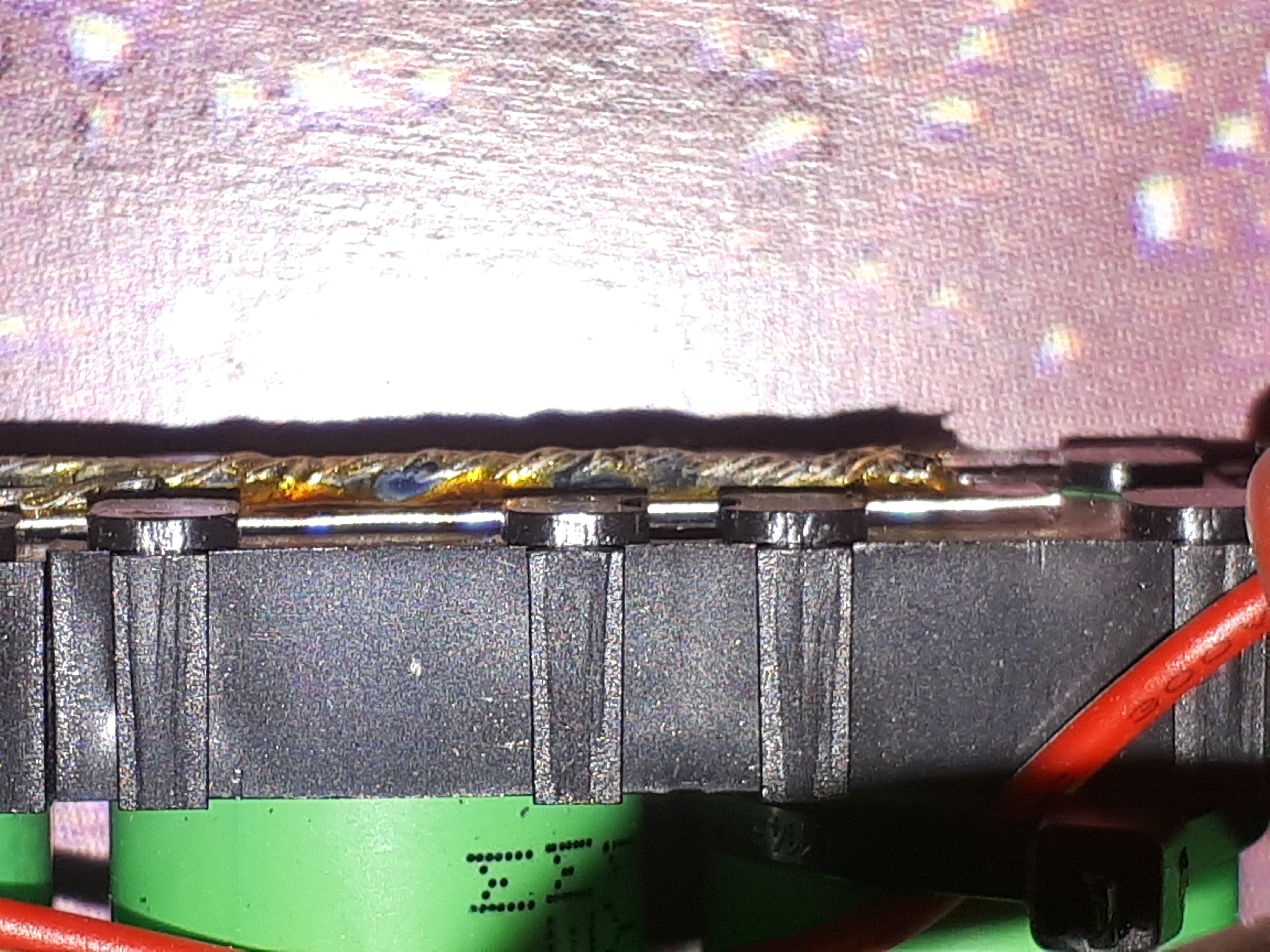 Nickel strips gotten loose from vibrations